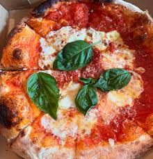 ITA Italian Kitchen signature dishes Spicy RigatoniMargherita PizzaTruffle Fries